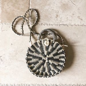Round cross body woven straw purse black tan